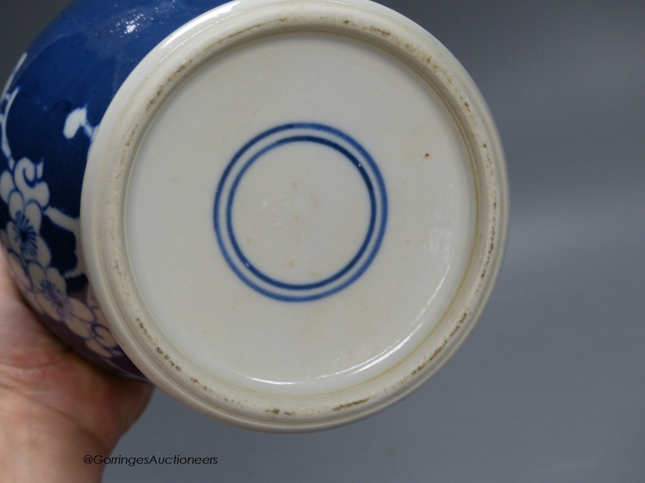 A Chinese blue and white 'prunus' jar and cover, height 22cm